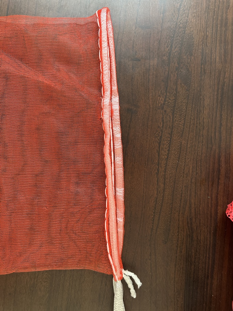 Drawstring and bag-mouth detail