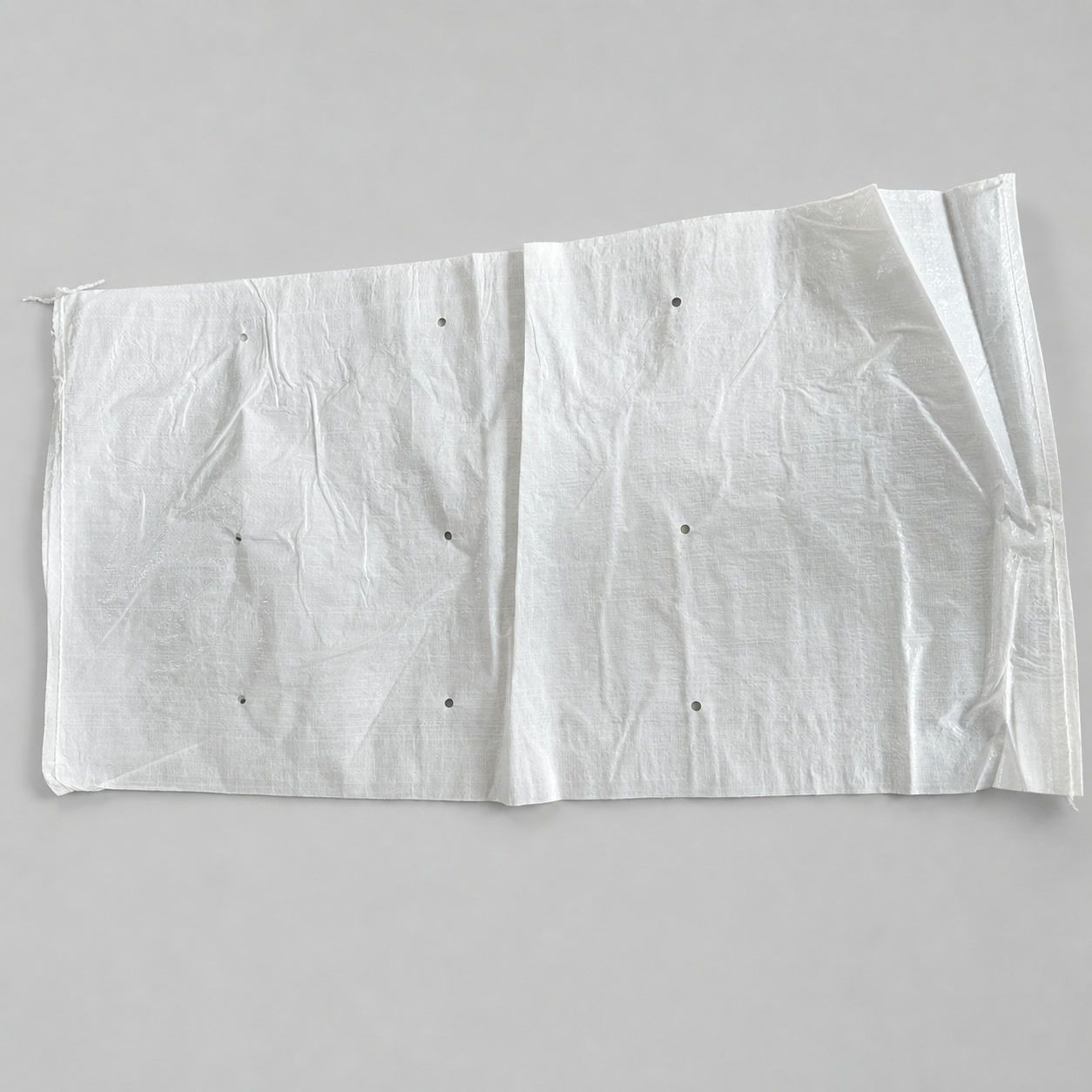 White ventilated woven bags