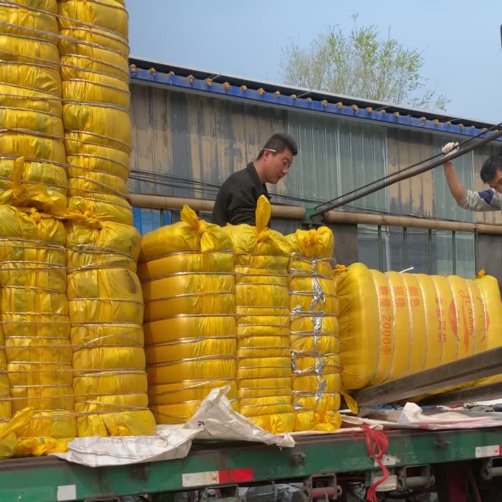 Loading packed bales