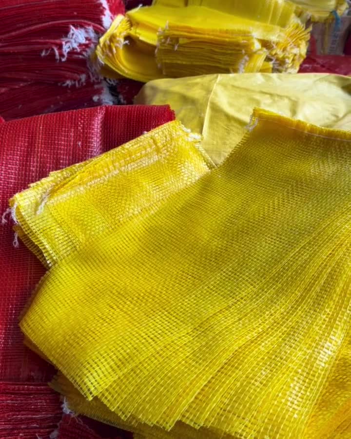 Handling yellow mesh bags